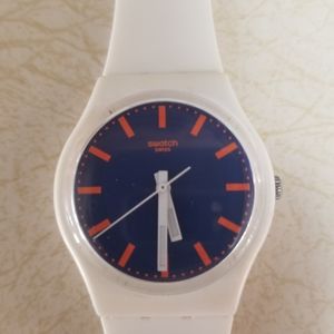 White swatch watch with blue face